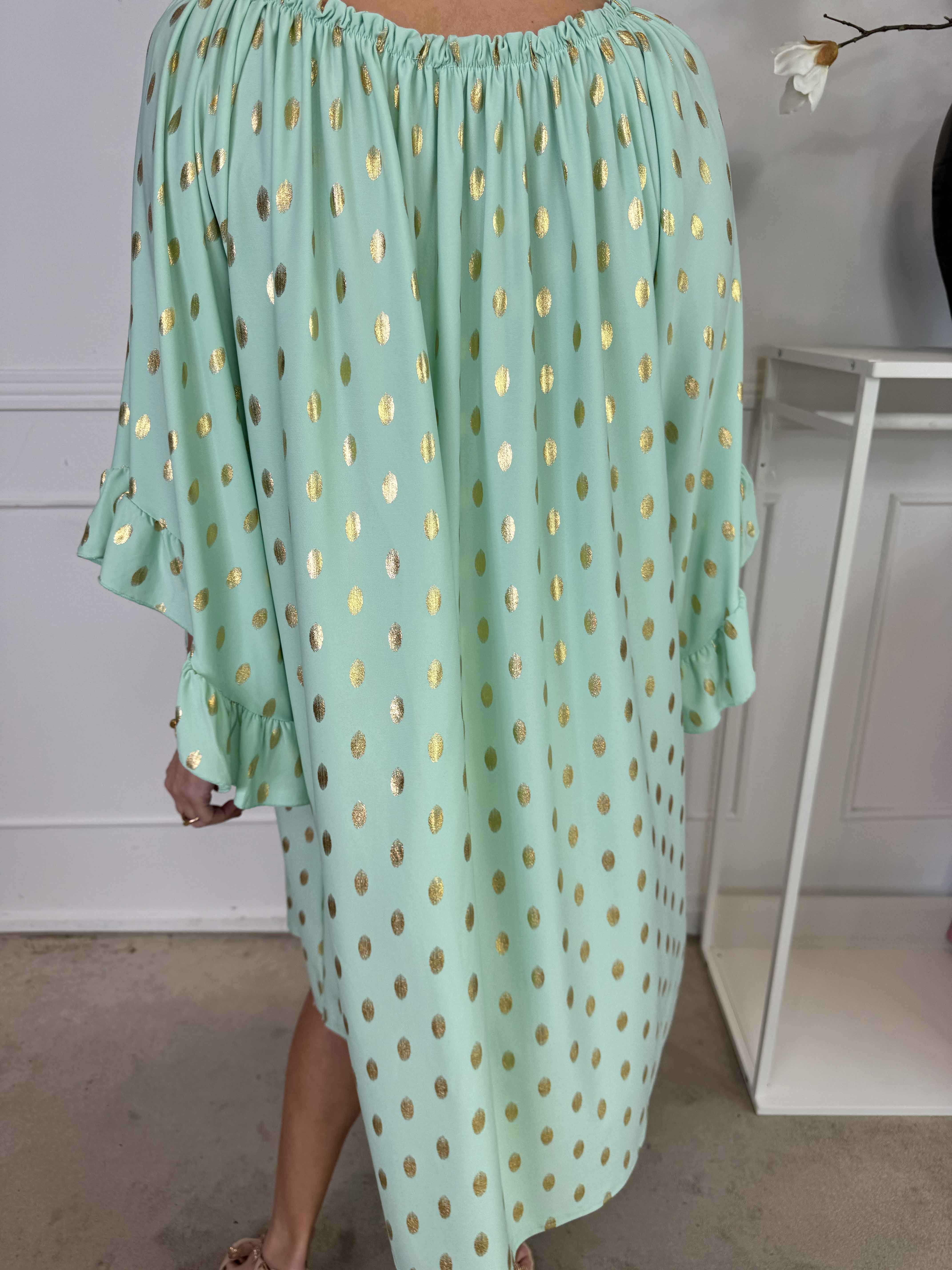 Yasma - Elastisk tunikaklänning med guldprickar och volangärmar